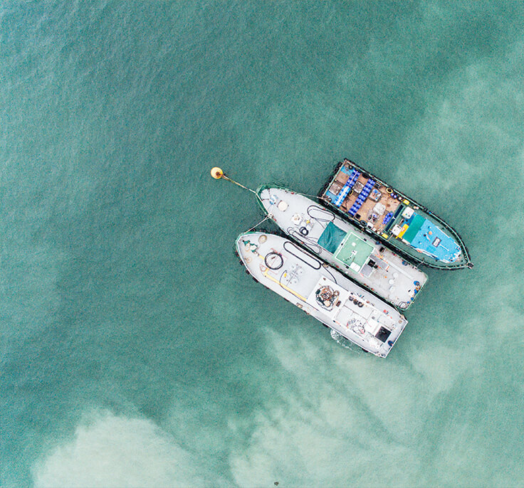 Shadow of Climate Impulse over the ocean, aerial view