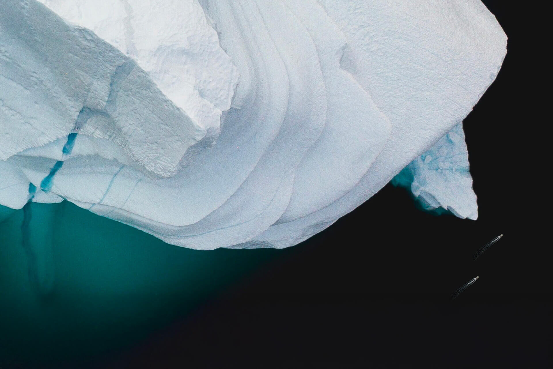 Shadow of a climate impact over a glacier, aerial view